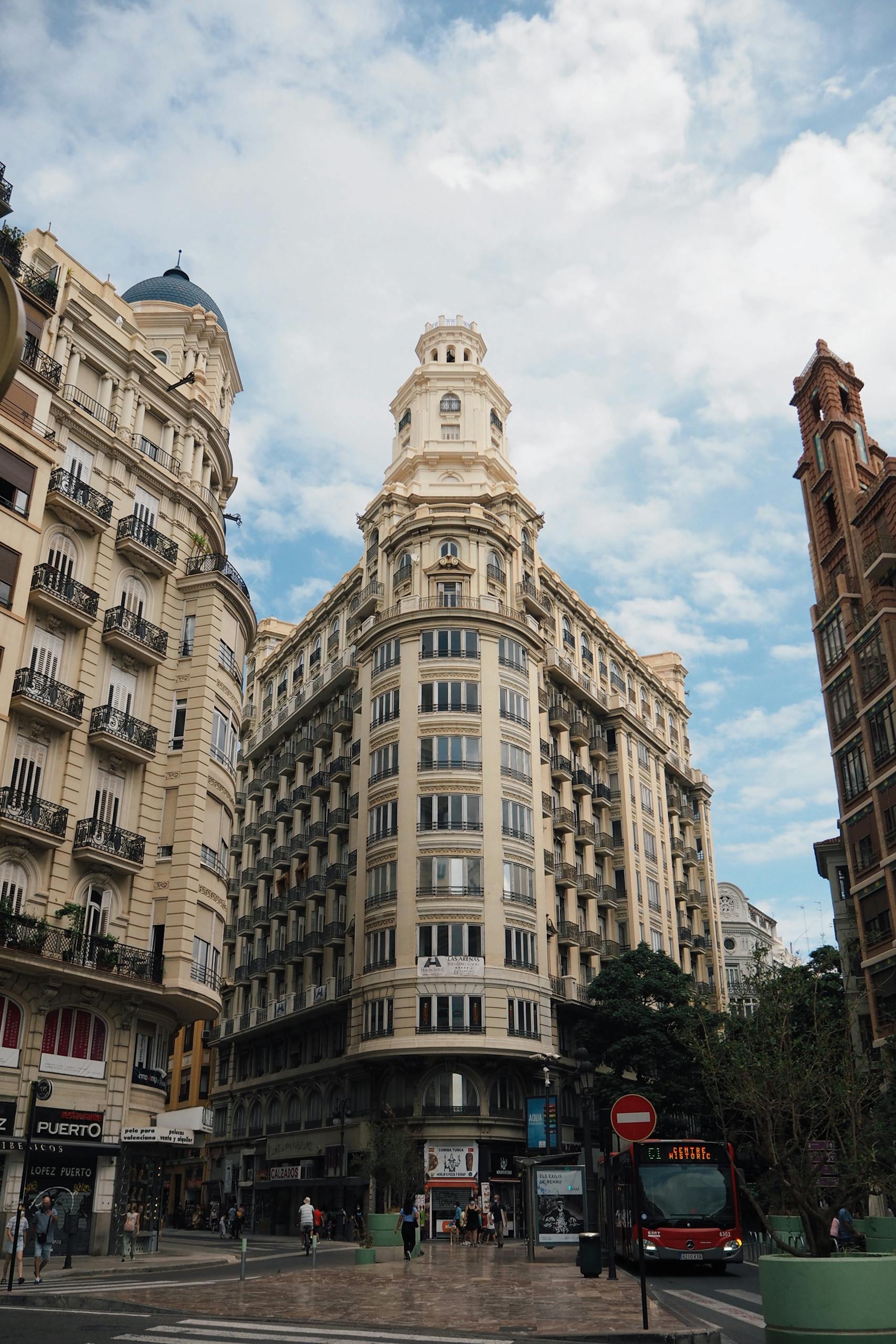 Stunning view of an iconic, historic building in Valencia's bustling city center.